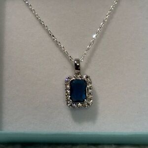Elegant Silver Necklace with Blue Gemstone Pendant